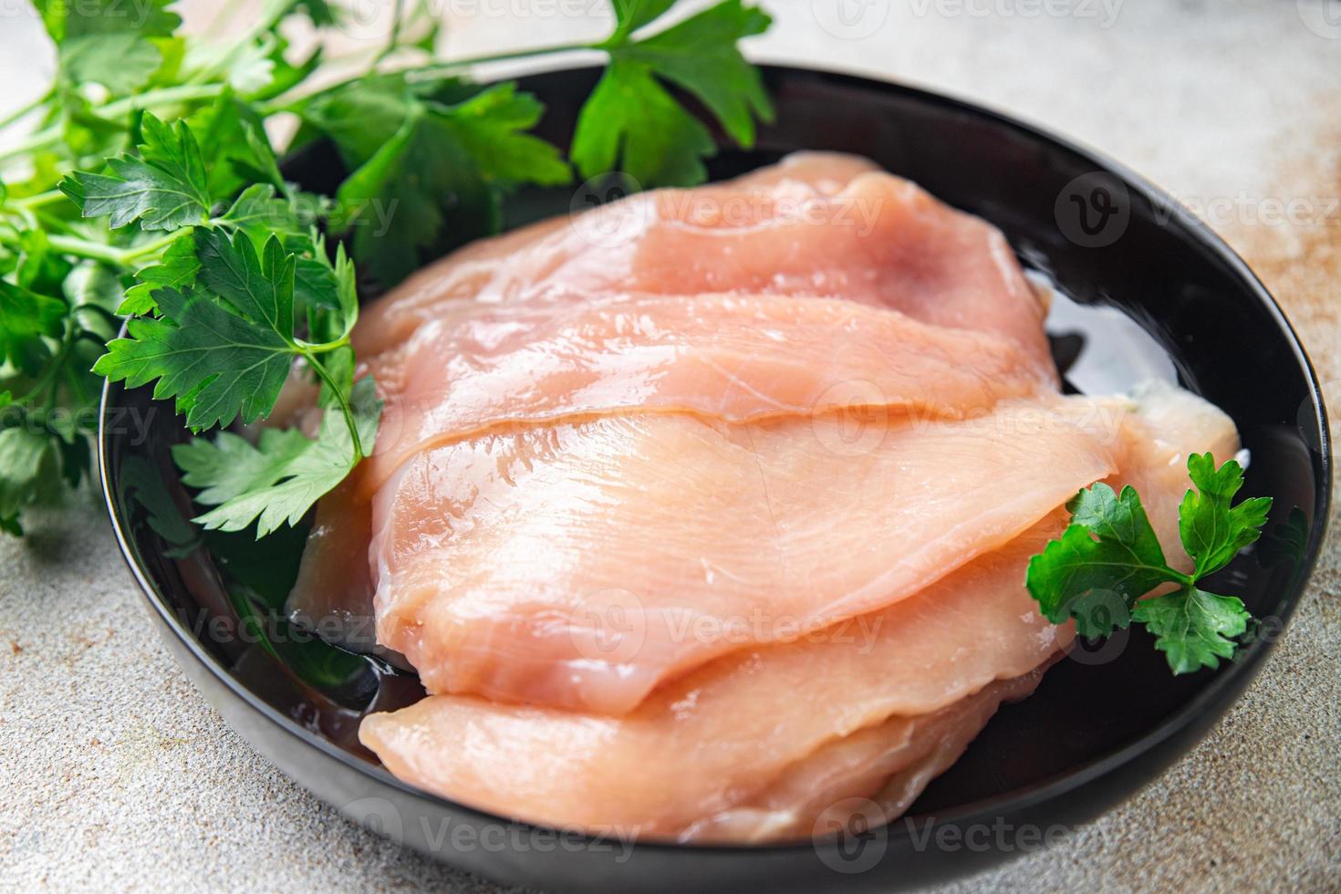 rebanadas de pechuga de pollo carne fresca aves de corral fondo de alimentos foto