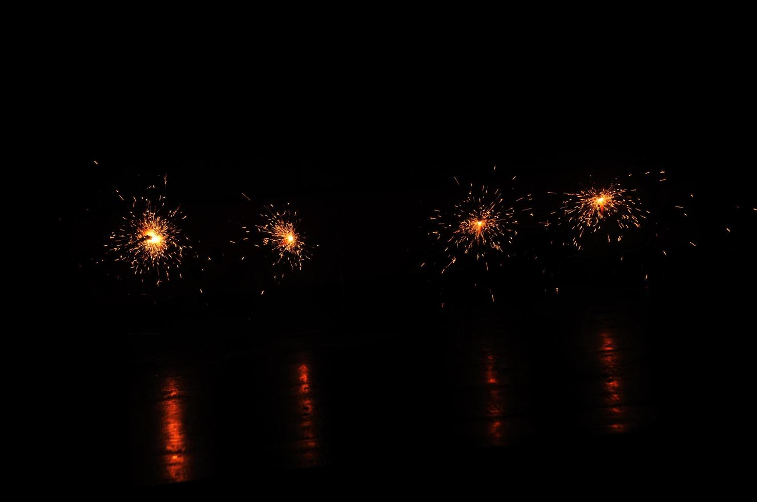 Fireworks are lit to welcome the New Year and new hope photo