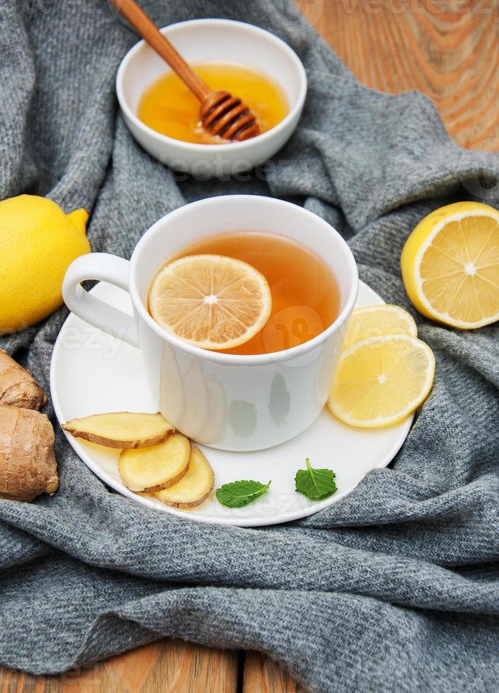 Cup of tea with lemon and ginger photo