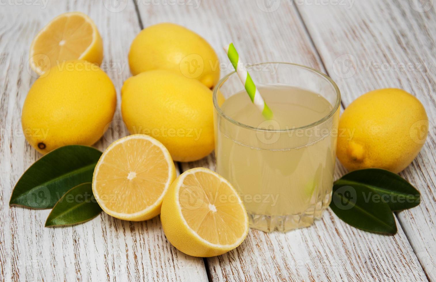 Glass of lemon juice photo