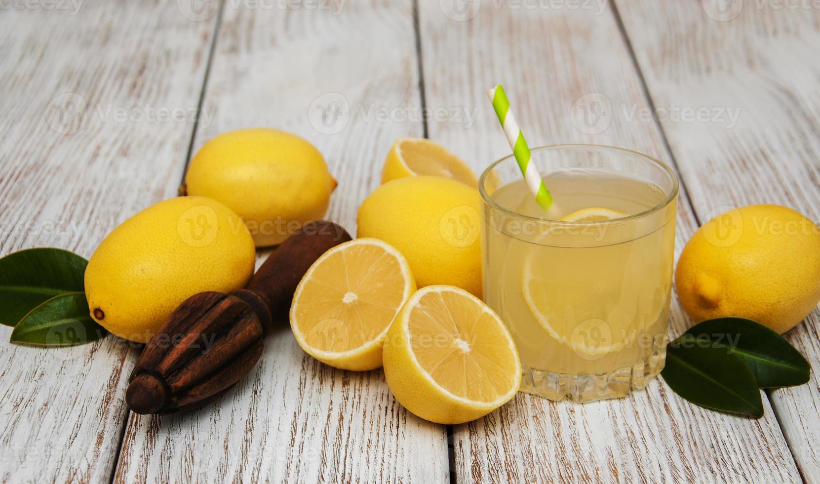 Glass of lemon juice photo