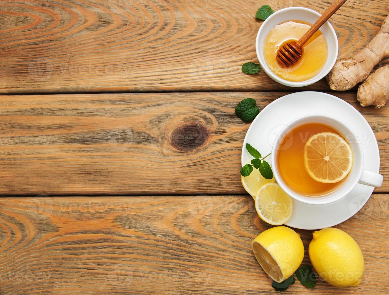 Cup of tea with lemon and ginger photo