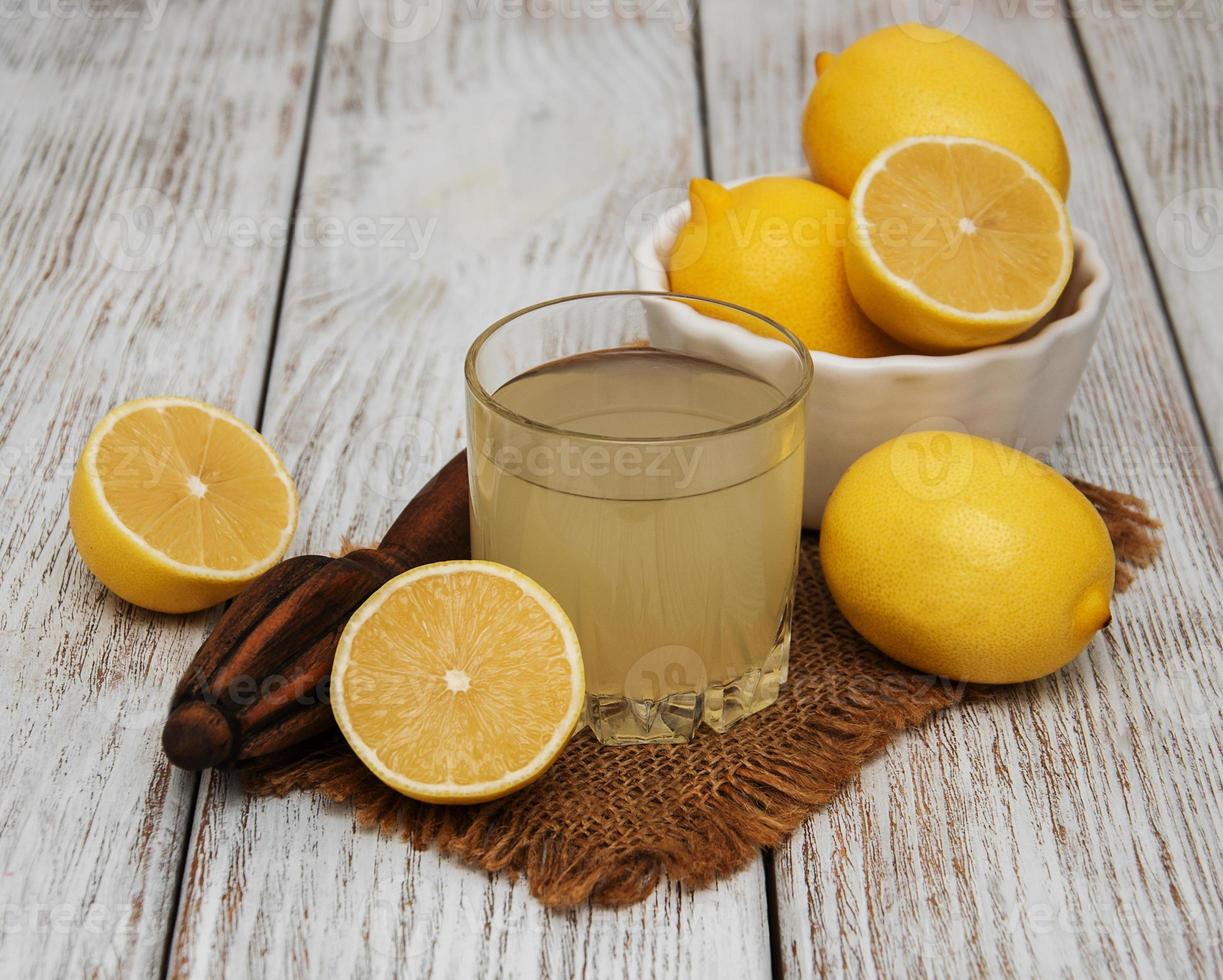 Glass of lemon juice photo