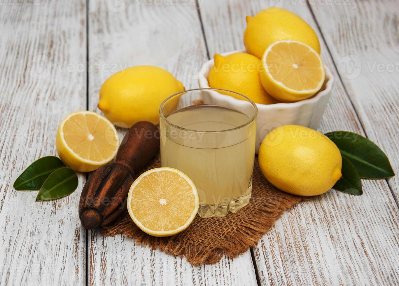 Glass of lemon juice photo