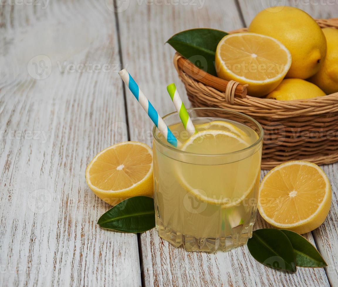 Glass of lemon juice photo