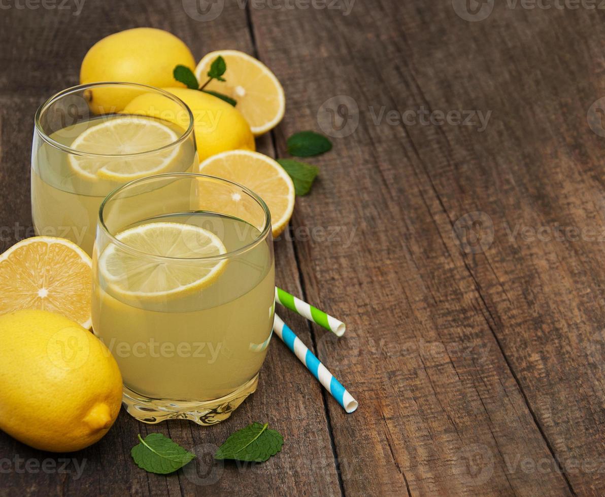 Glasses of lemon juice photo