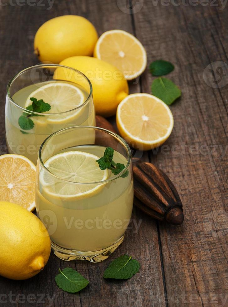 Glasses of lemon juice photo