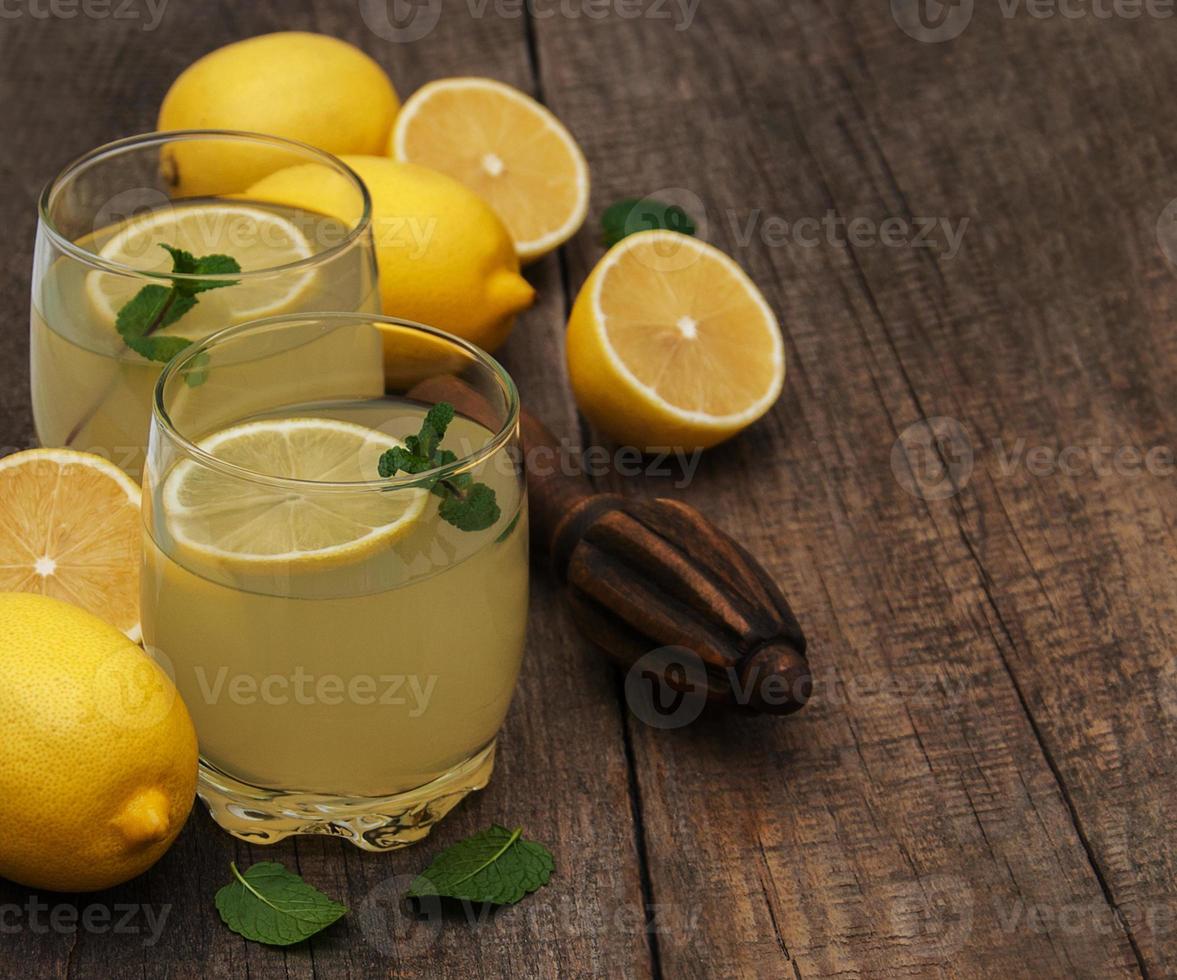 Glasses of lemon juice photo