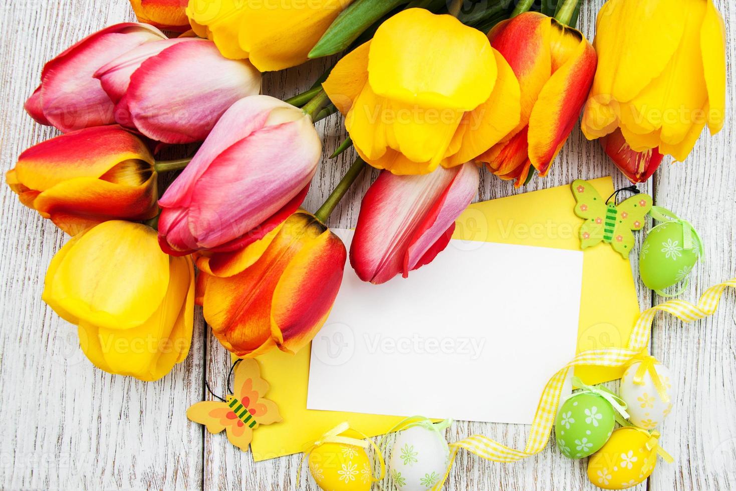 Easter eggs and tulips photo