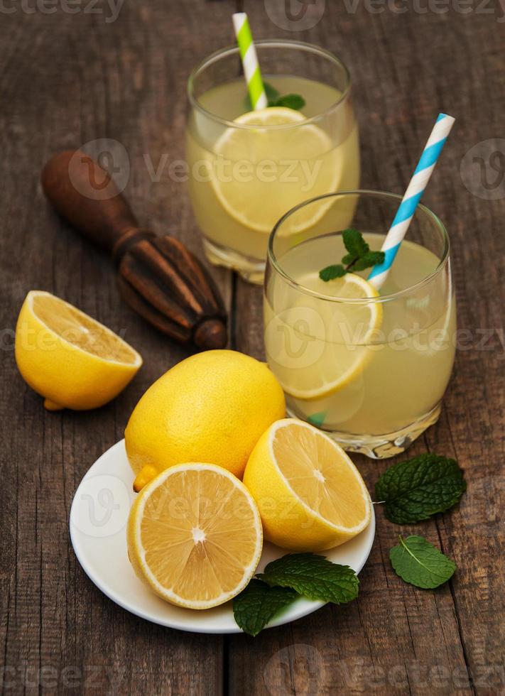 Glasses of lemon juice photo