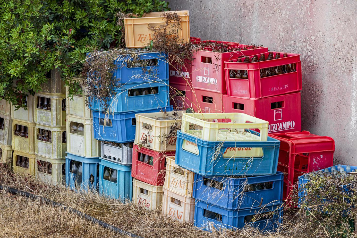 Old beer crates stacked outside Mallorca Spain. photo