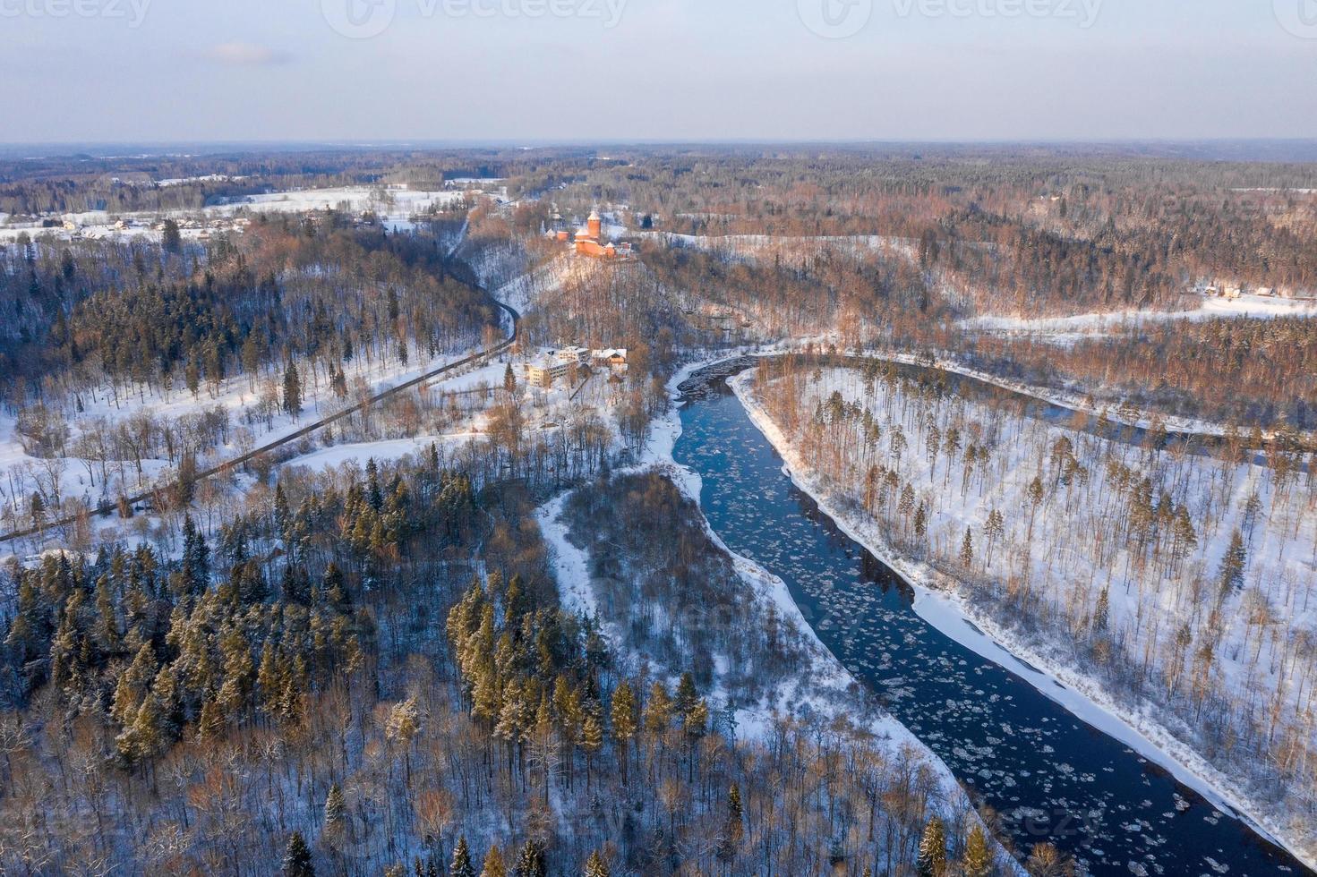 Winter in Sigulda, Latvia. River Gauja and Turaida Castle in background. photo