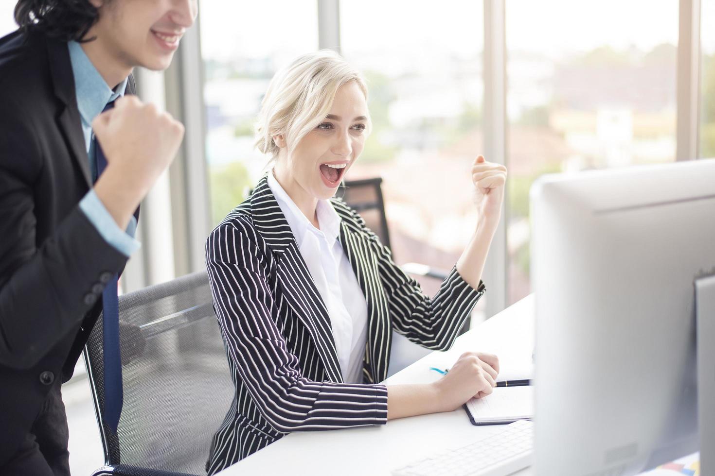 Business people are happy with business success in office photo