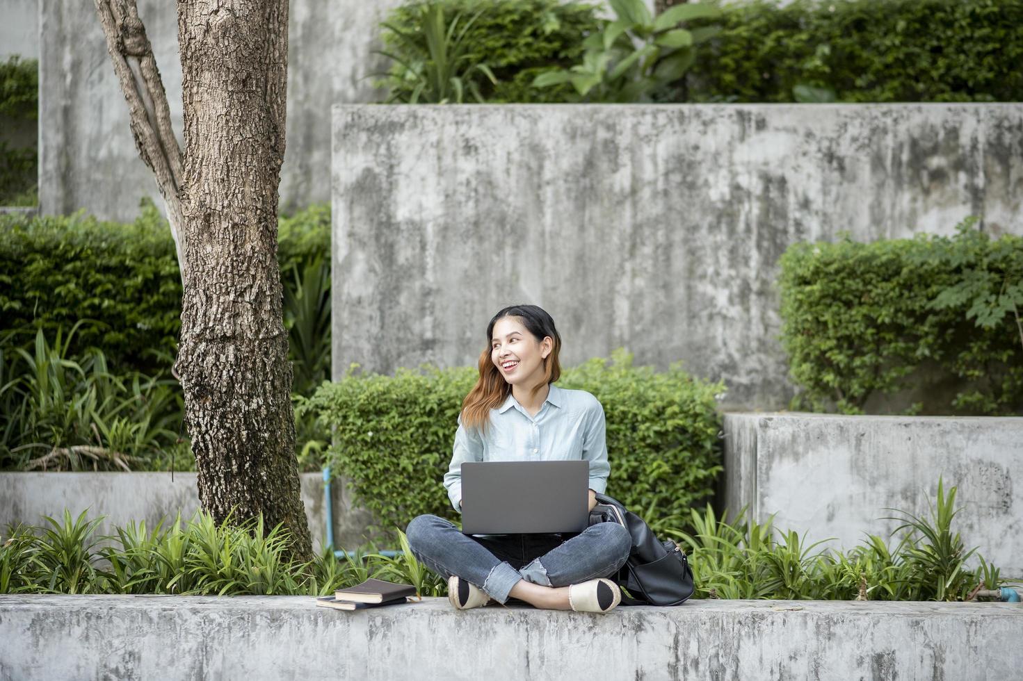 Happy young Asian University student. photo