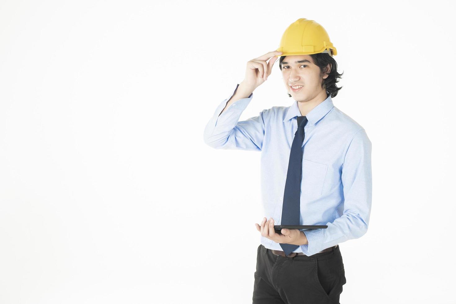 Portrait of Caucasian  handsome  engineering man is confident on white background photo