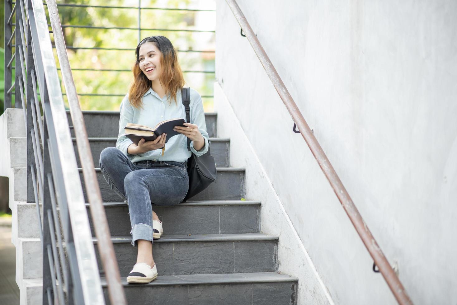 Happy young Asian University student. photo