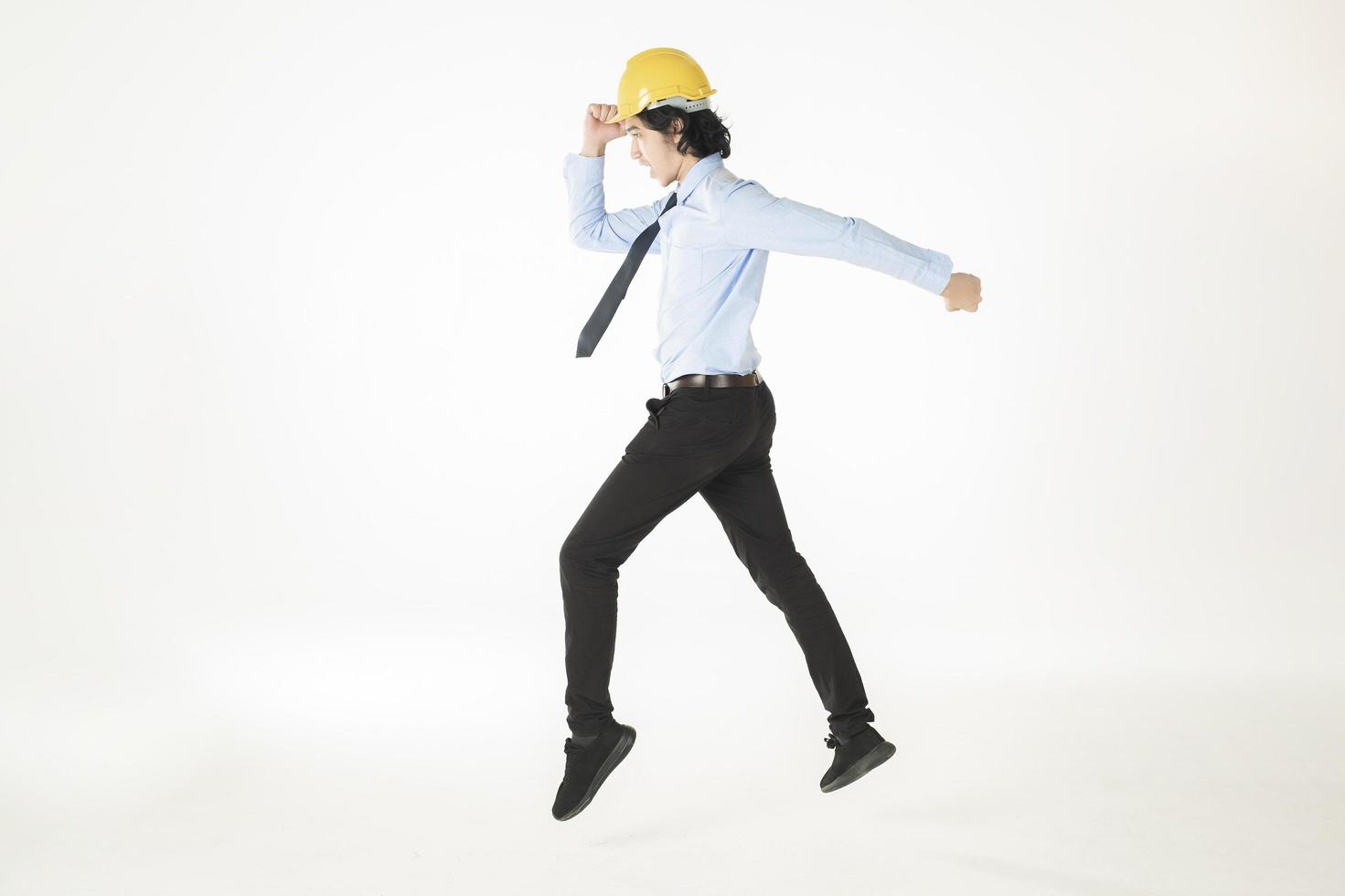 engineering Man wearing yellow helmet on white photo