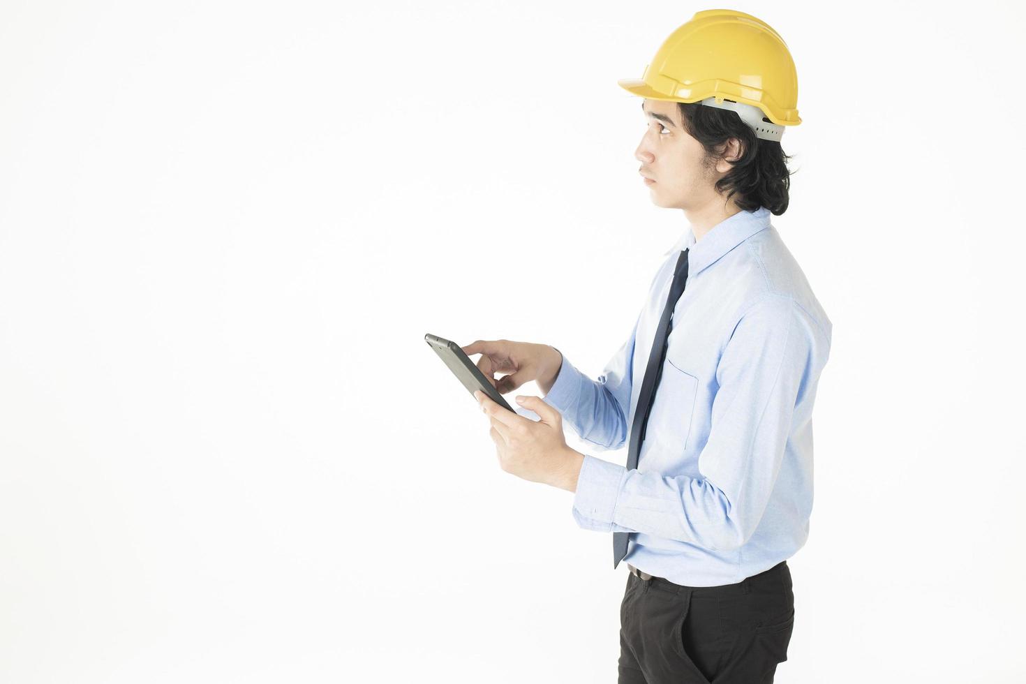 ingeniero, hombre, llevando, casco amarillo, blanco foto