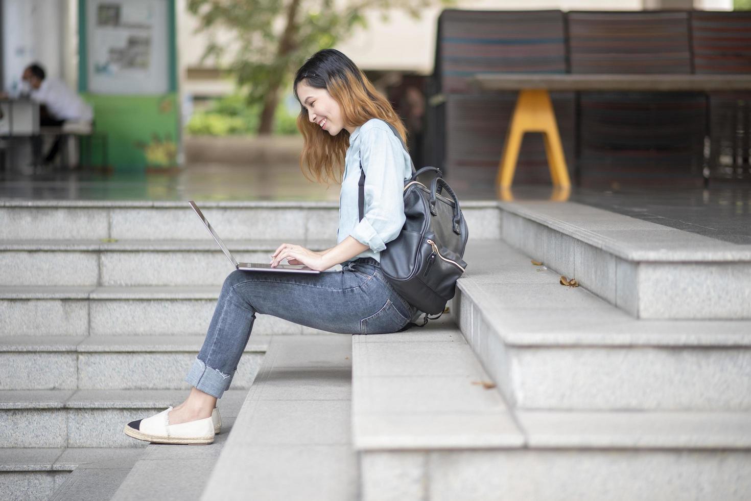 Happy young Asian University student. photo