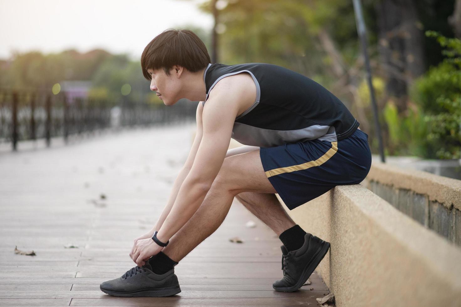 A man is exercise in the park. photo