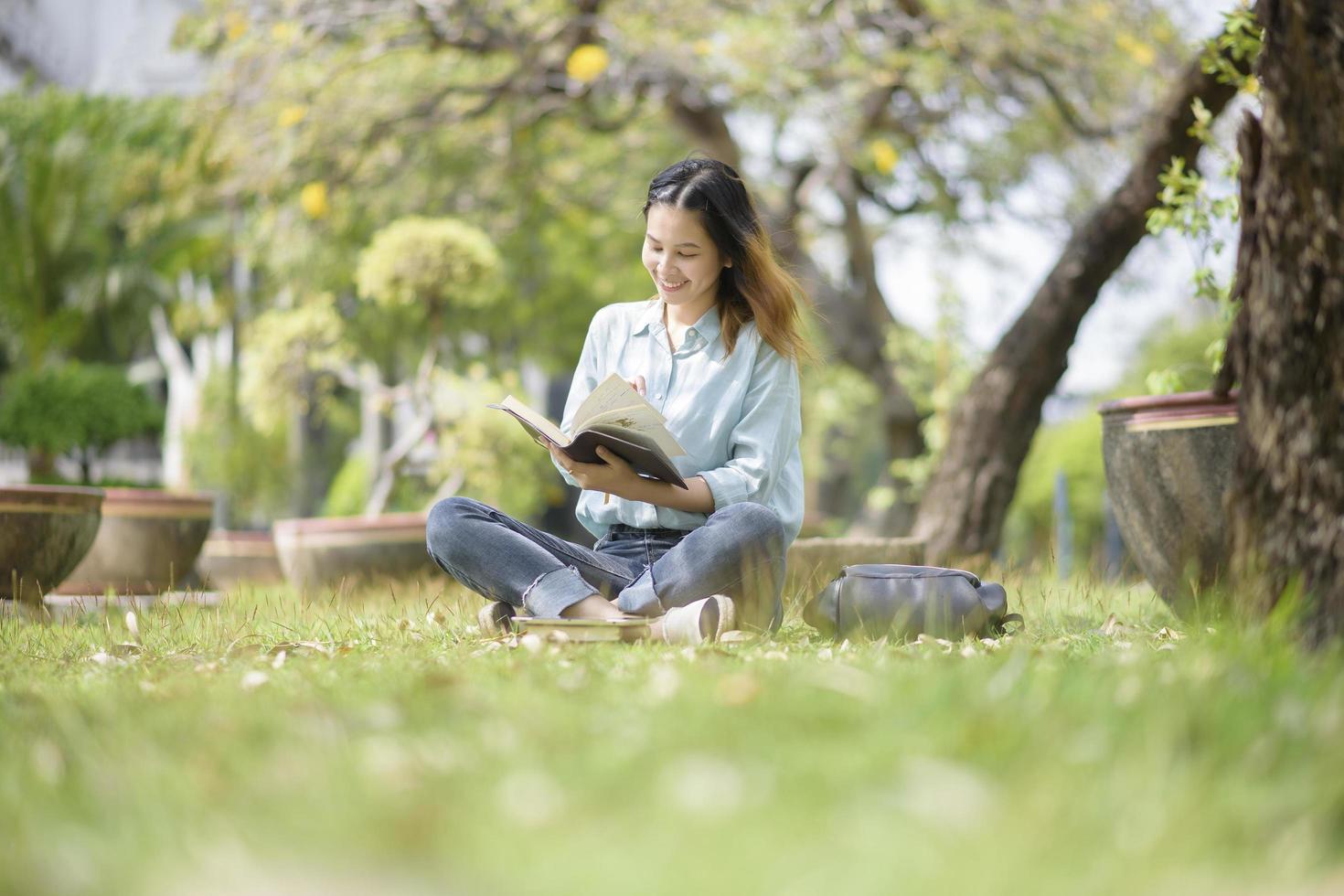 Happy young Asian University student. photo