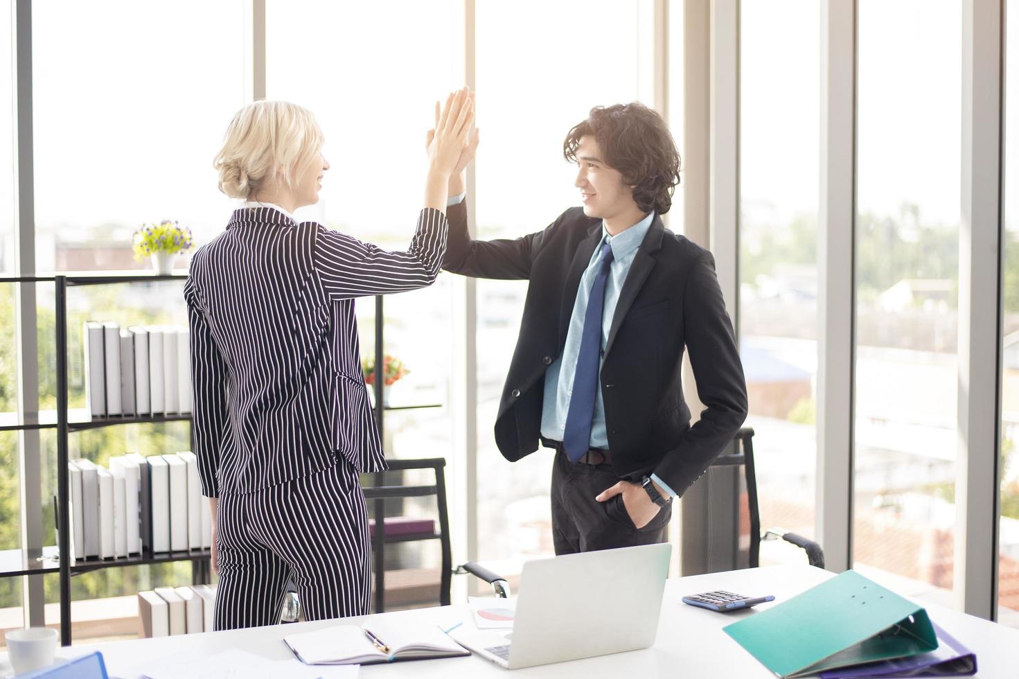 Business people are happy with business success in office photo