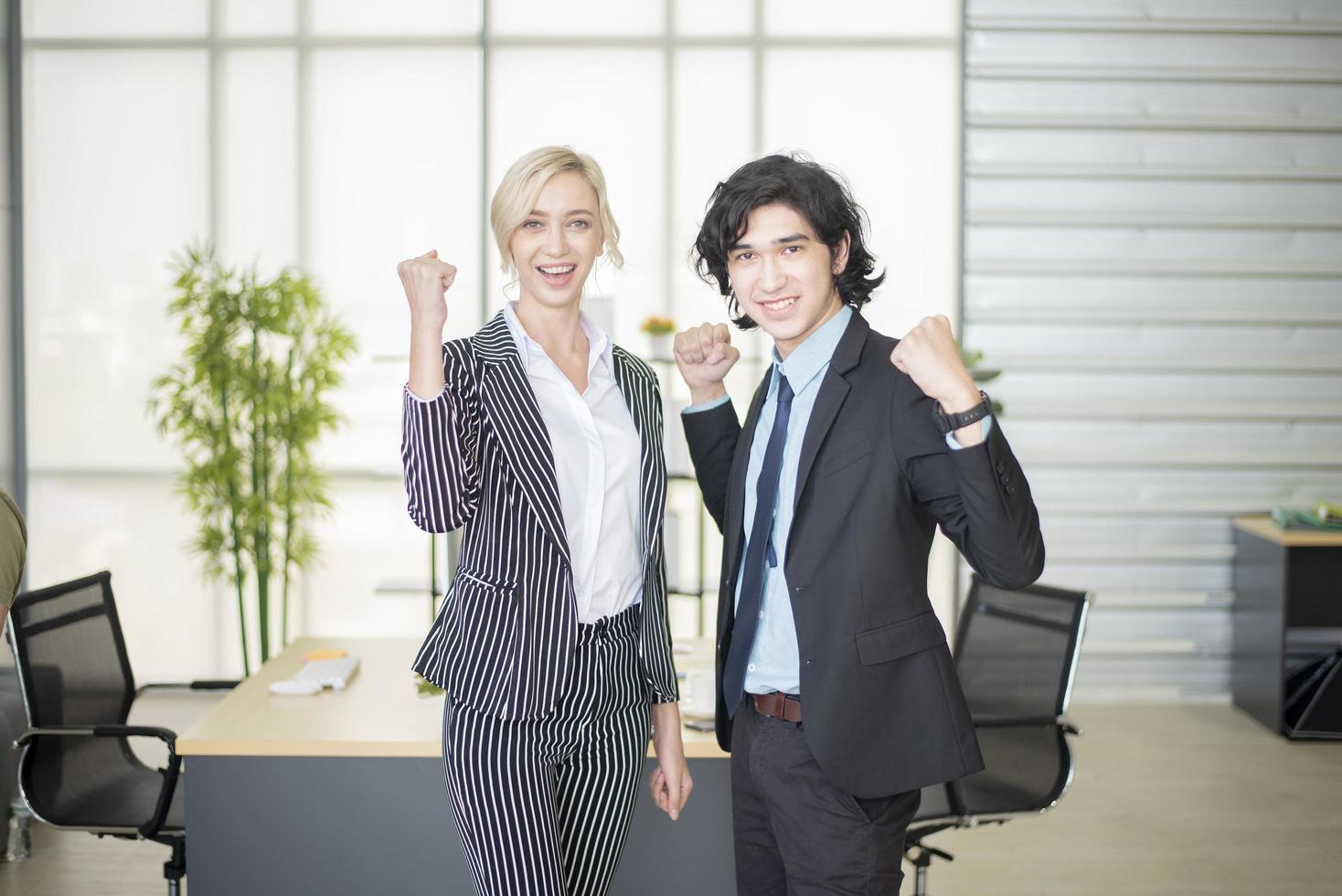 Business people are happy with business success in office photo