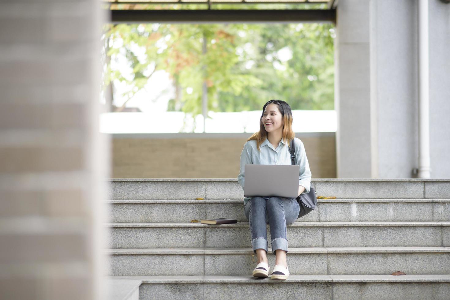 Happy young Asian University student. photo