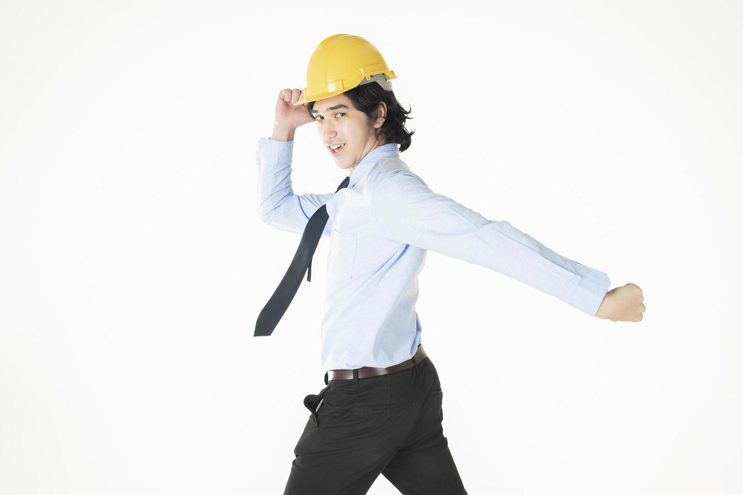 engineering Man wearing yellow helmet on white photo