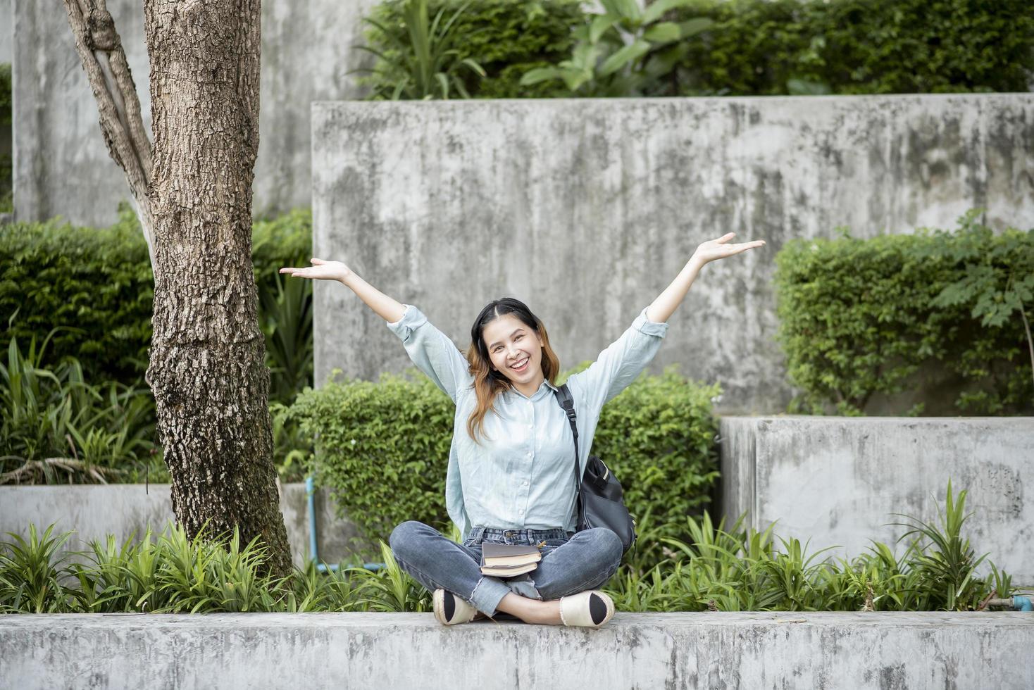 Happy young Asian University student. photo