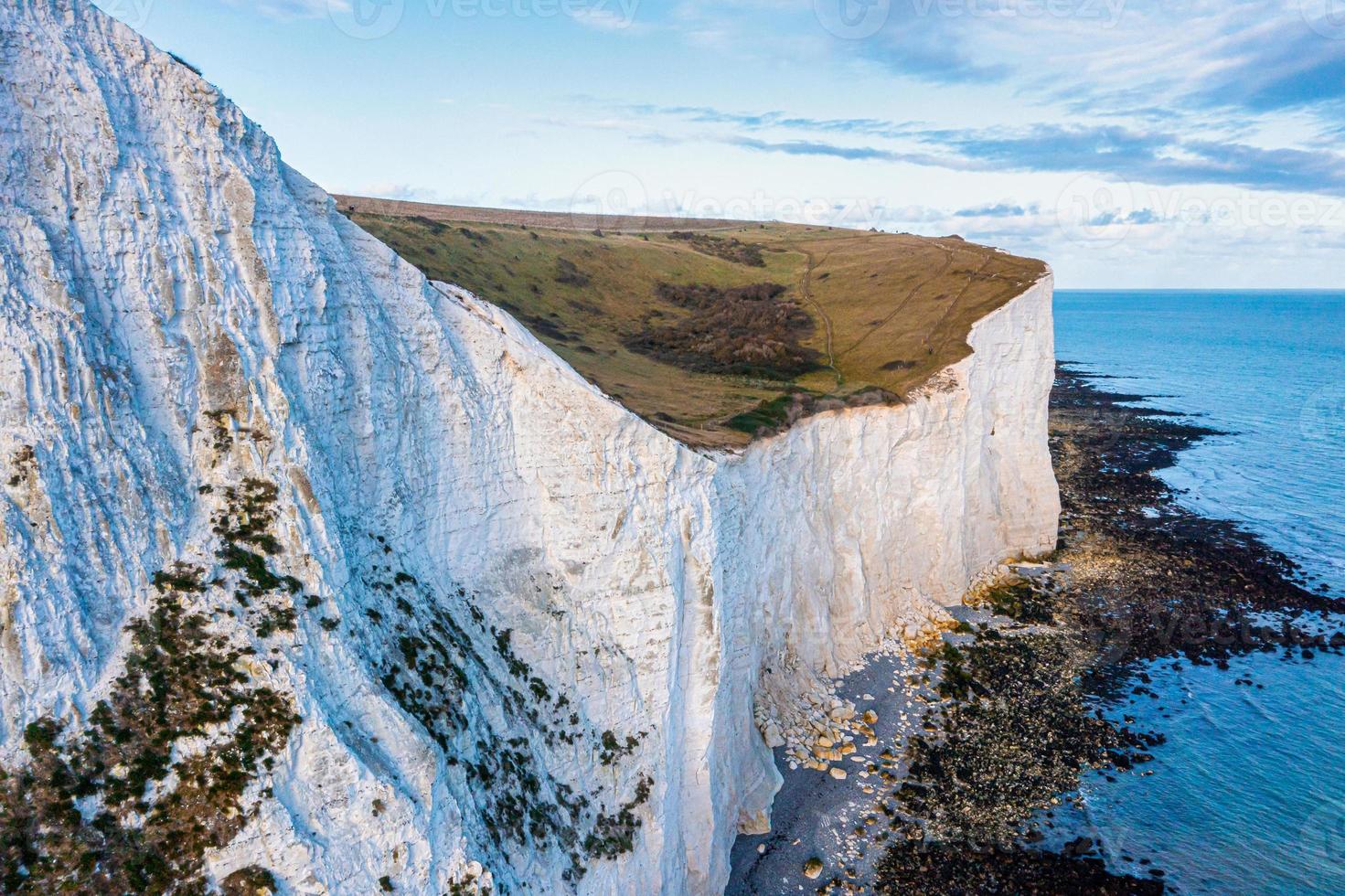 Aerial view of the White Cliffs of Dover. Close up view of the cliffs from the sea side. 5086910