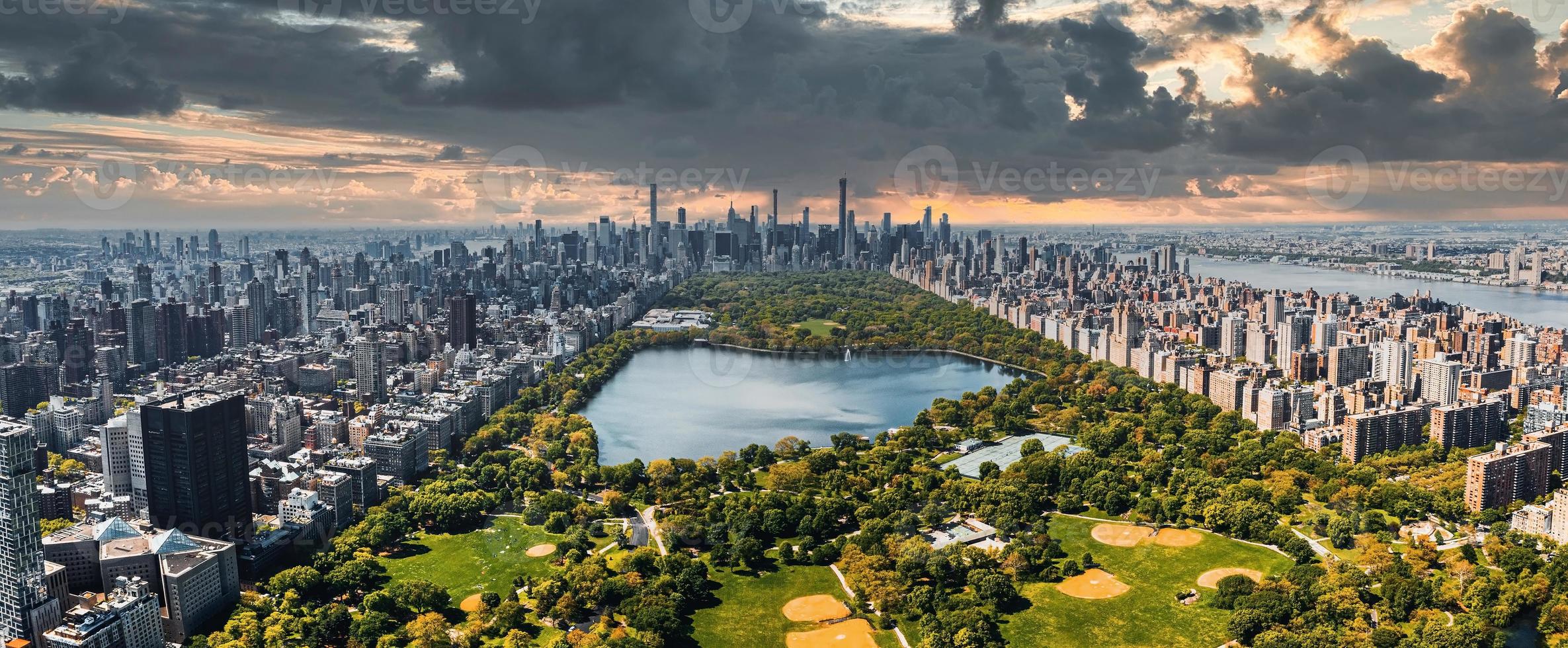 Central Park aerial view in Manhattan, New York. huge beautiful park is surrounded by skyscraper photo