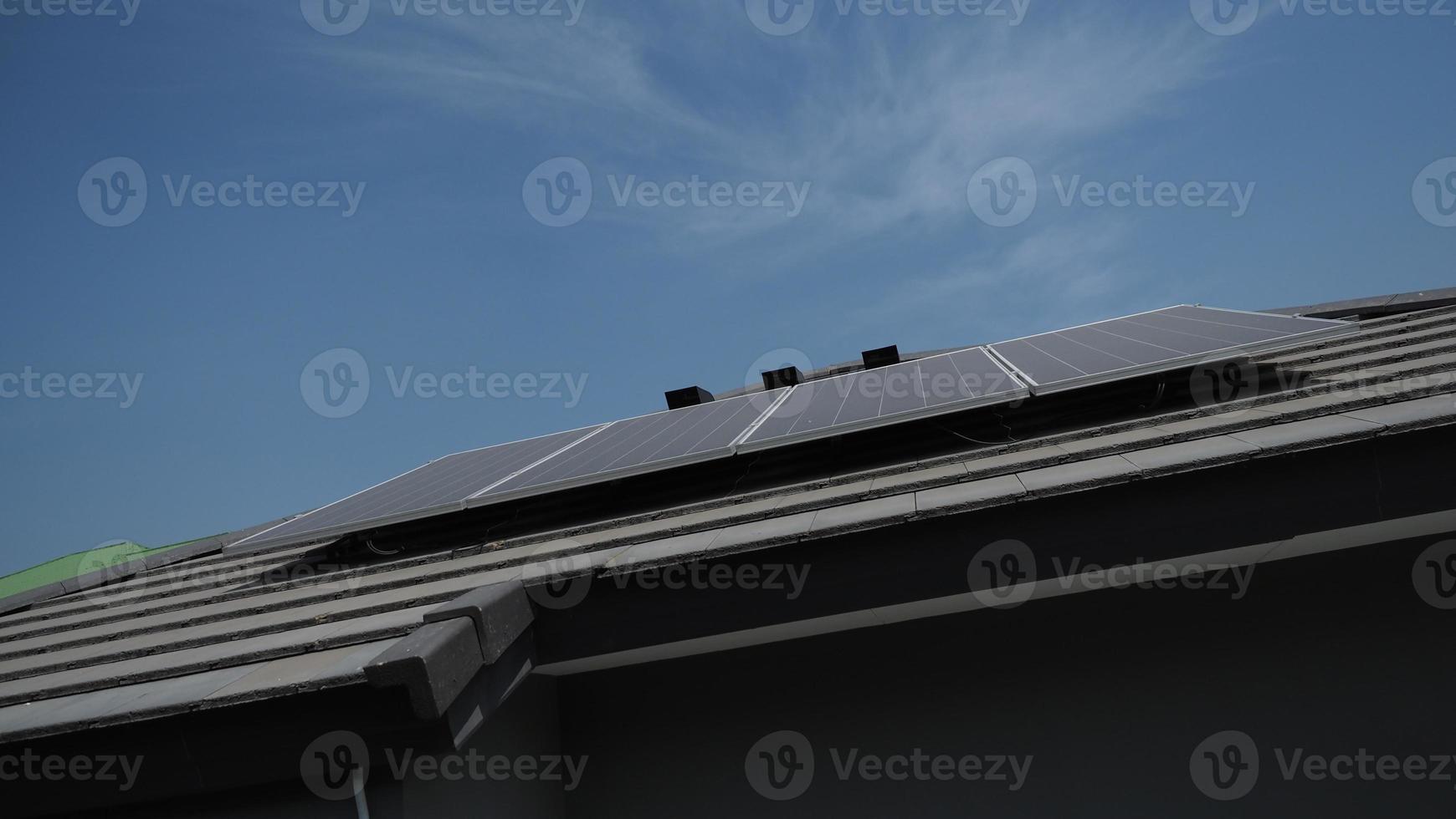 Photovoltaic. Solarcell panel. Solar roof power plant on the roof photo