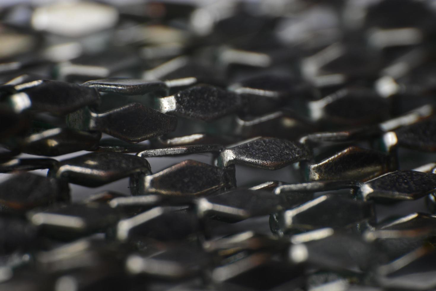 Close up with rusty chain from an old necklace photo