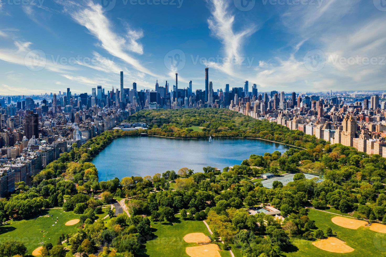 Central Park aerial view in Manhattan, New York. huge beautiful park is surrounded by skyscraper photo