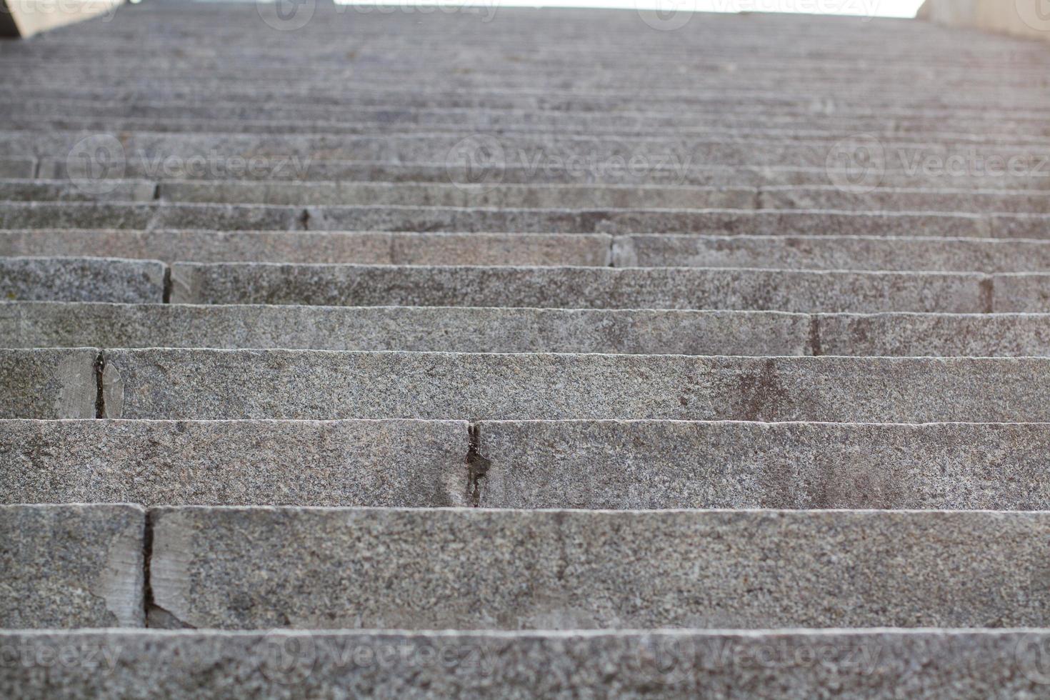 Abstract stairs in black and white, abstract steps, stairs in the city. Granite stairs,wIde stone stairway often seen on monuments and landmarks. Selective focus. photo