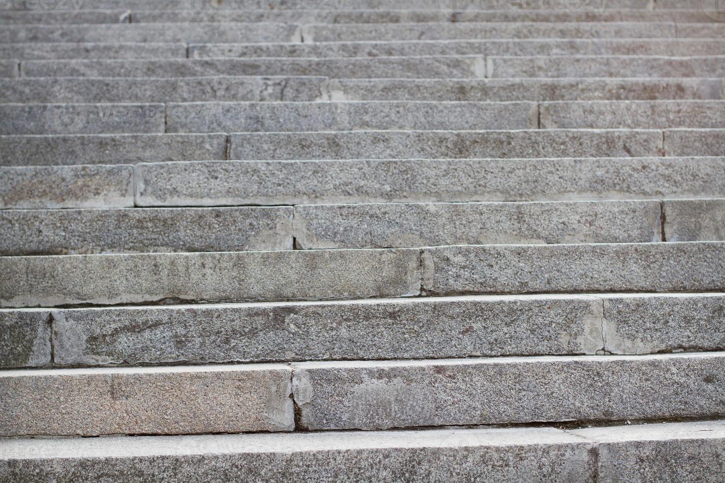 Abstract stairs in black and white, abstract steps, stairs in the city. Granite stairs,wIde stone stairway often seen on monuments and landmarks. Selective focus. photo