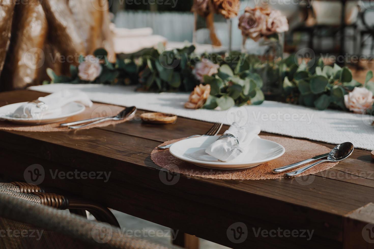 close-up plate and napkin on dining table photo