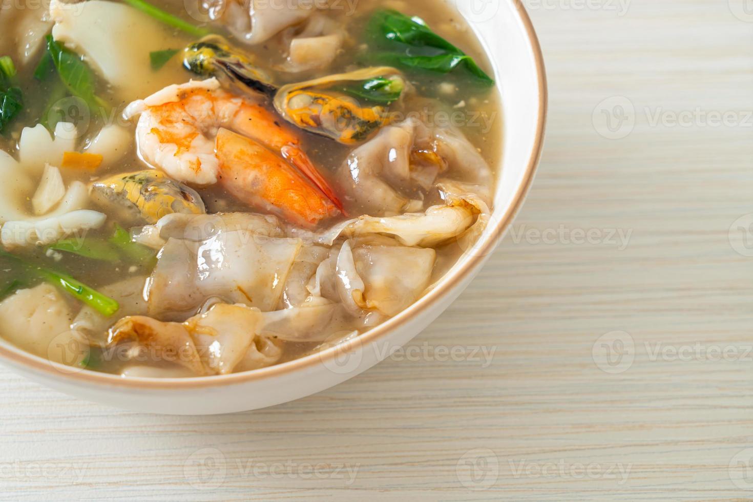Wide Rice Noodles with Seafood in Gravy Sauce photo