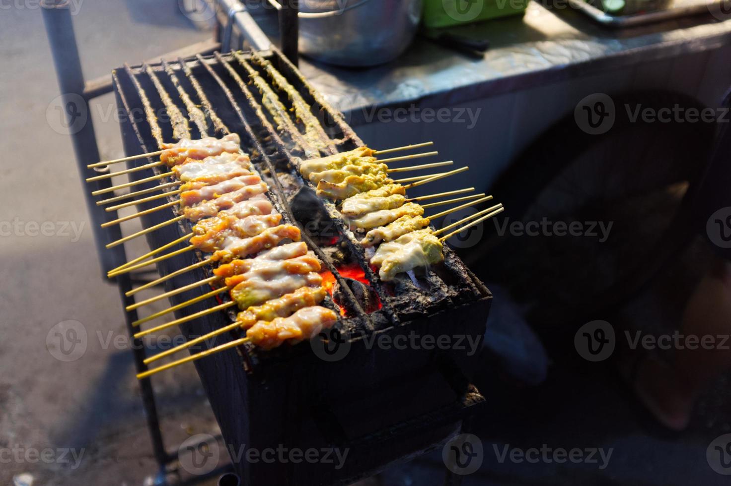 THAI FOOD , Pork Satay on stove . photo