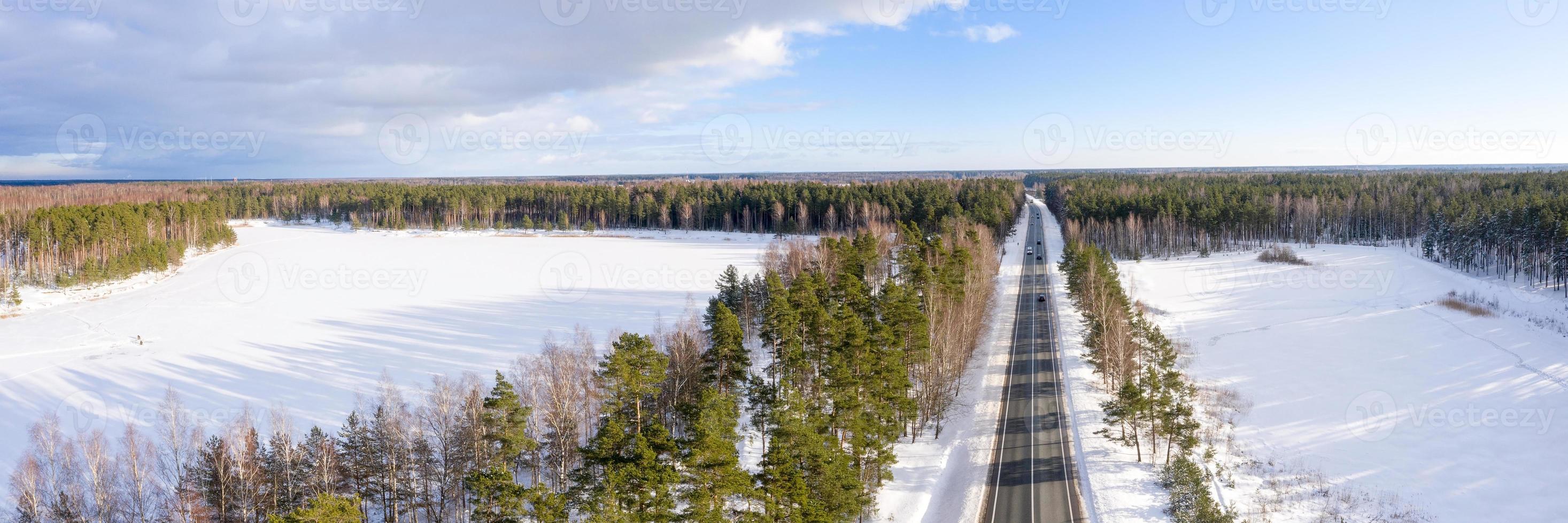 Road in the winter Alps. Winter landscape. Aerial view photo