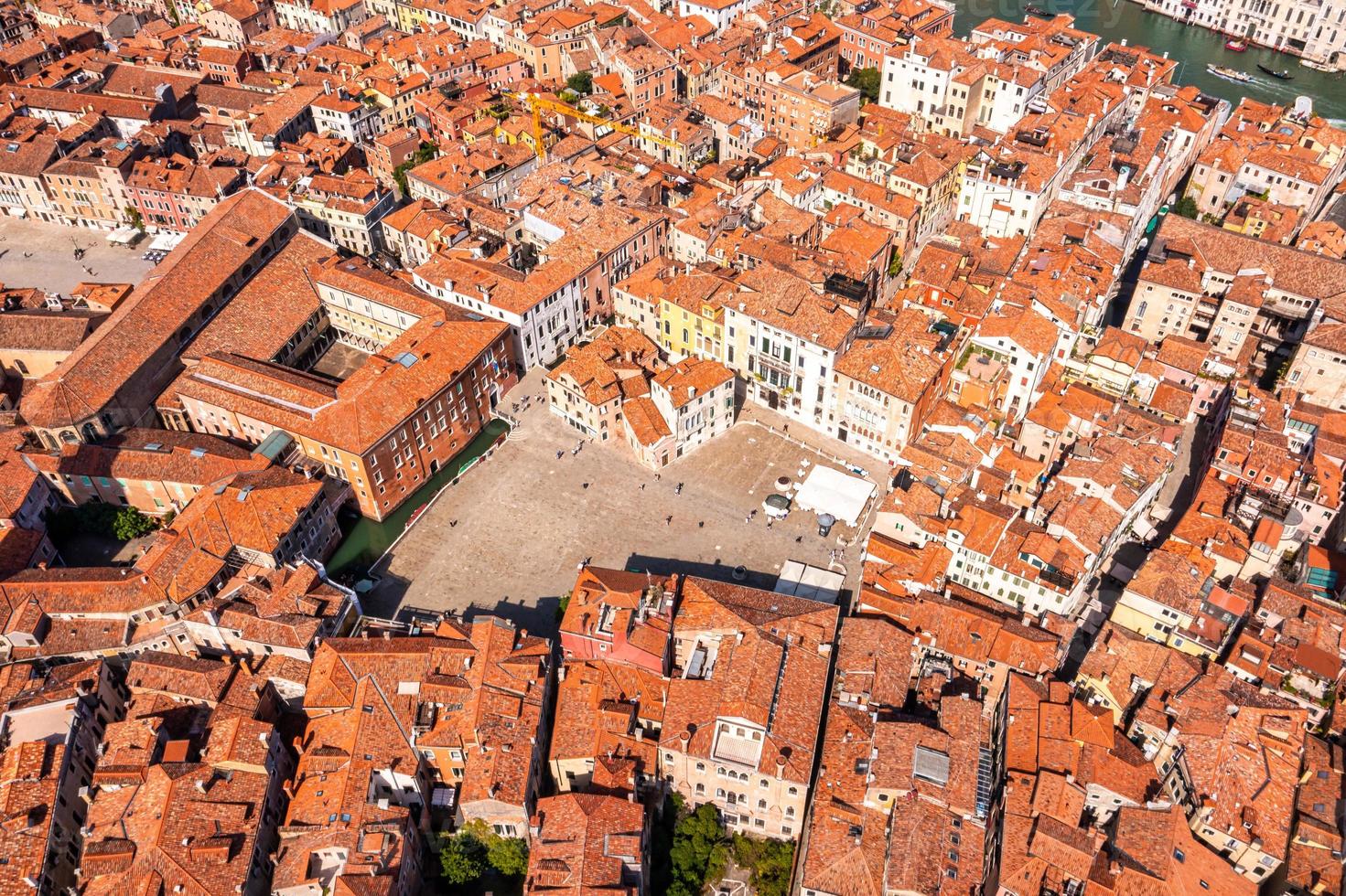 Beautiful orange roofs of Venice in Italy. Aerial view. photo