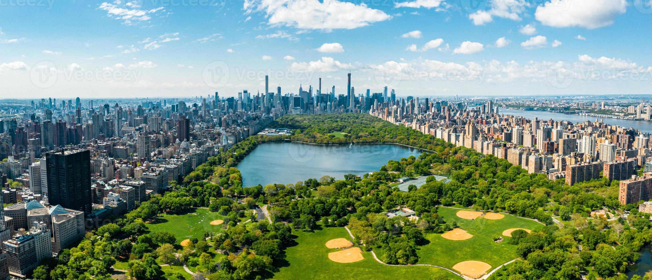 Central Park aerial view in Manhattan, New York. huge beautiful park is surrounded by skyscraper photo