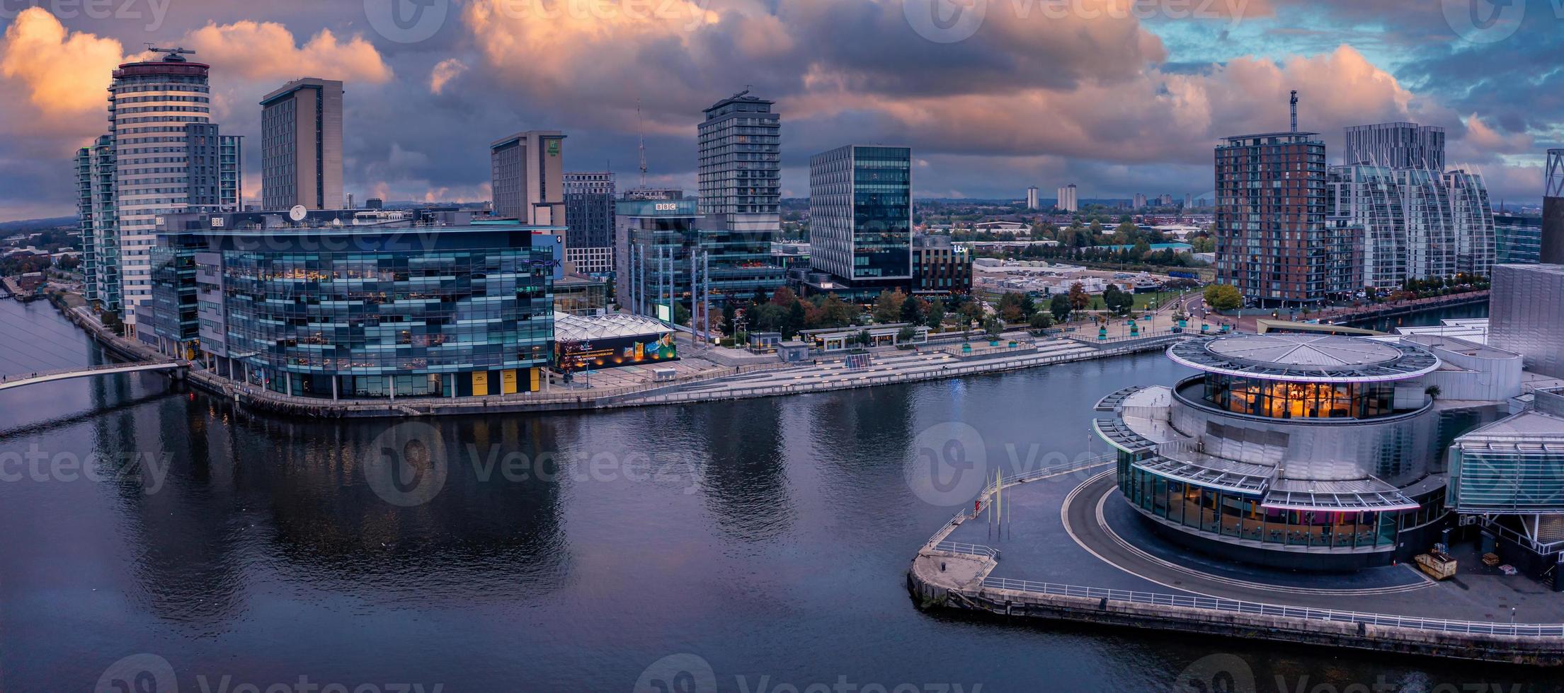 Aerial view of the Media City UK is on the banks of the Manchester at dusk photo