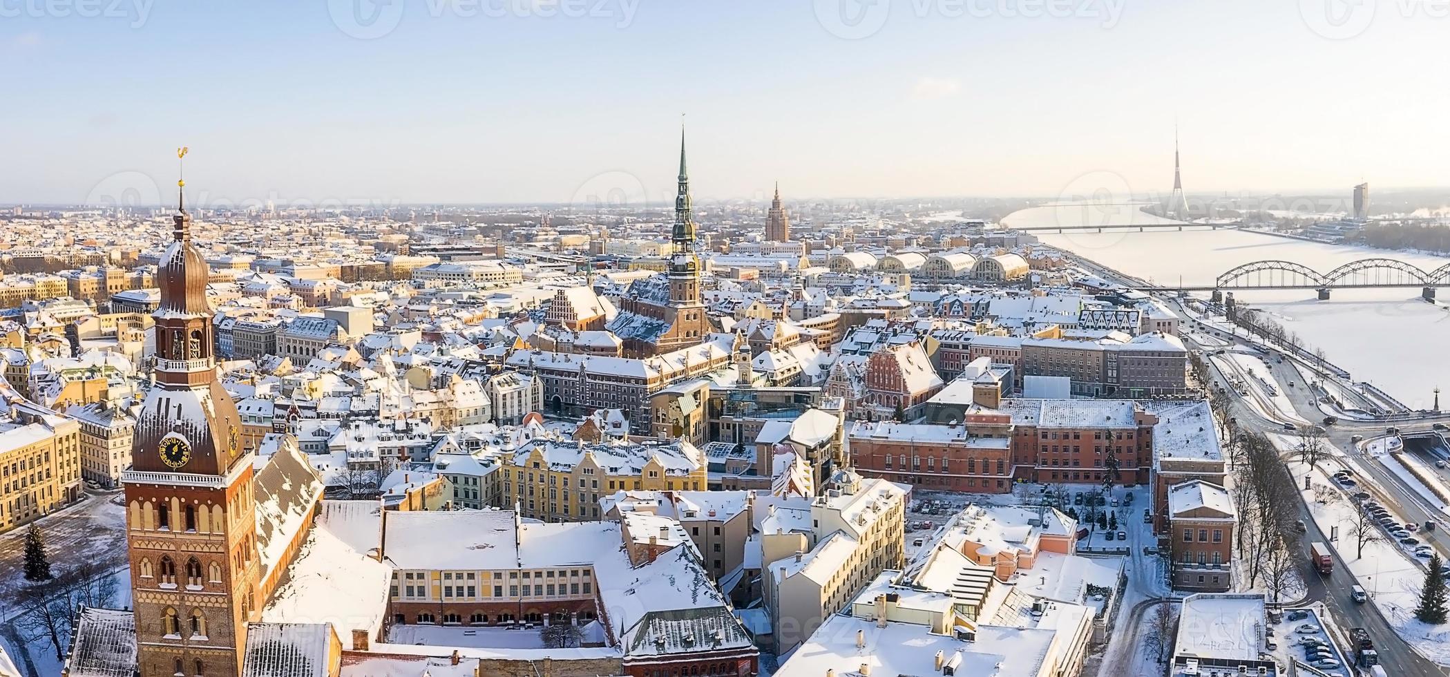 Aerial panorama view of Riga old town during beautiful winter day in Latvia. Freezing temperature in Latvia. White Riga. photo