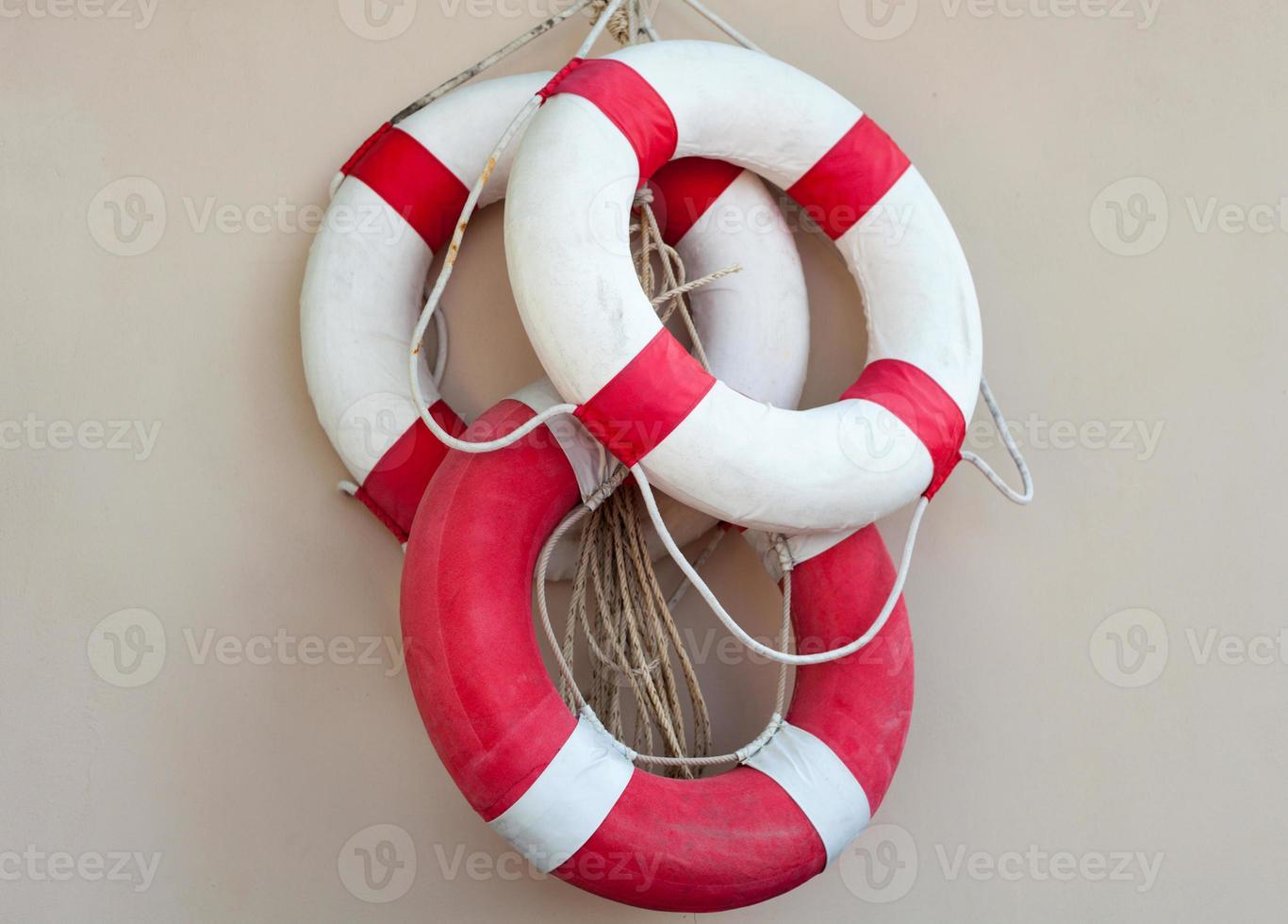 The life Buoy on the wall . photo