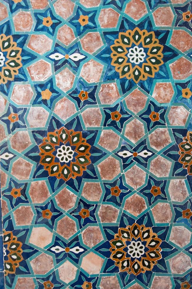 asian old ceramic mosaic. elements of oriental ornament on ceramic tiles photo