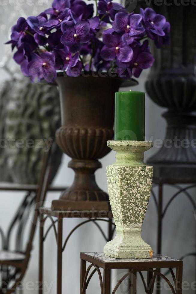 green candle on a candlestick photo