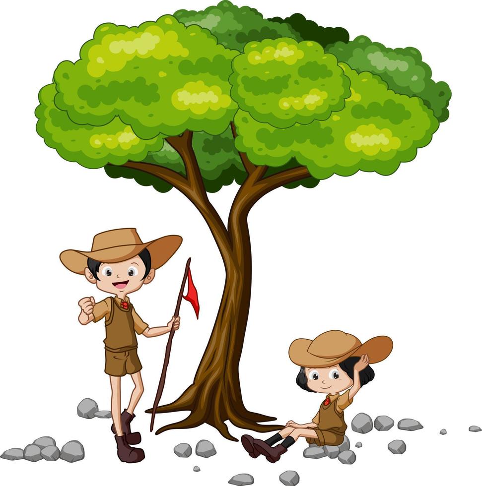Cute scouts posing under a tree vector