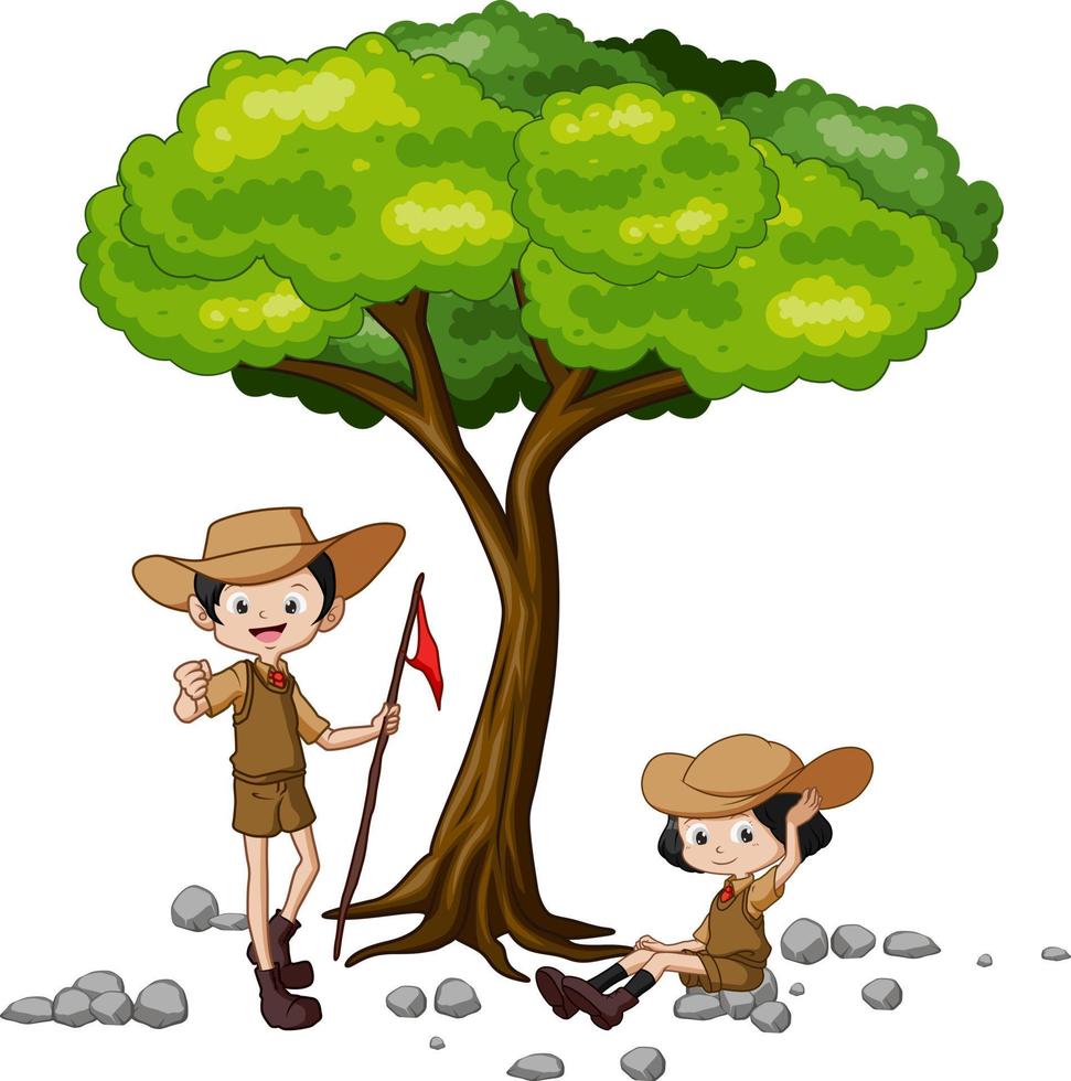 Cute scouts posing under a tree vector